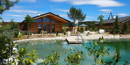 Hüttendorf - Schwerpunkt: Badeurlaub - Landhaus Aussenansicht - Kittenberger Chalets am Gartensee