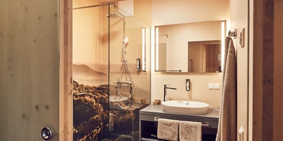Hüttendorf - Schwerpunkt: Badeurlaub - Studio Badezimmer  - Kittenberger Chalets am Gartensee