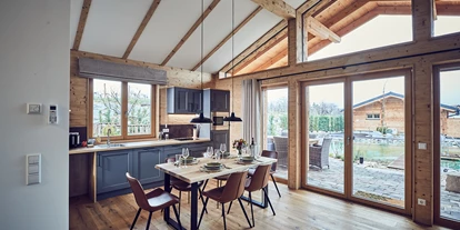 Hüttendorf - Schwerpunkt: Badeurlaub - Landhaus Essbereich  - Kittenberger Chalets am Gartensee