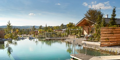 Hüttendorf - Pools: Schwimmteich - Kittenberger Chalets am Gartensee