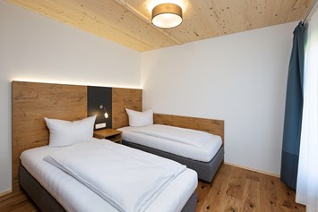 Chalet: Schlafzimmer mit 2 Einzelbetten - Niederauer Hof Chalets