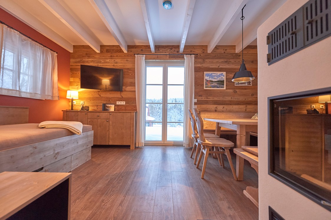 Chalet: Wohn- und Essbereich Premium Lodge / Premium Lodge Plus - Das Schierke Harzresort