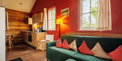 Hüttendorf - PLZ 38871 (Deutschland) - Kuschel Lodge - Wohnbereich / Küche - Das Schierke Harzresort