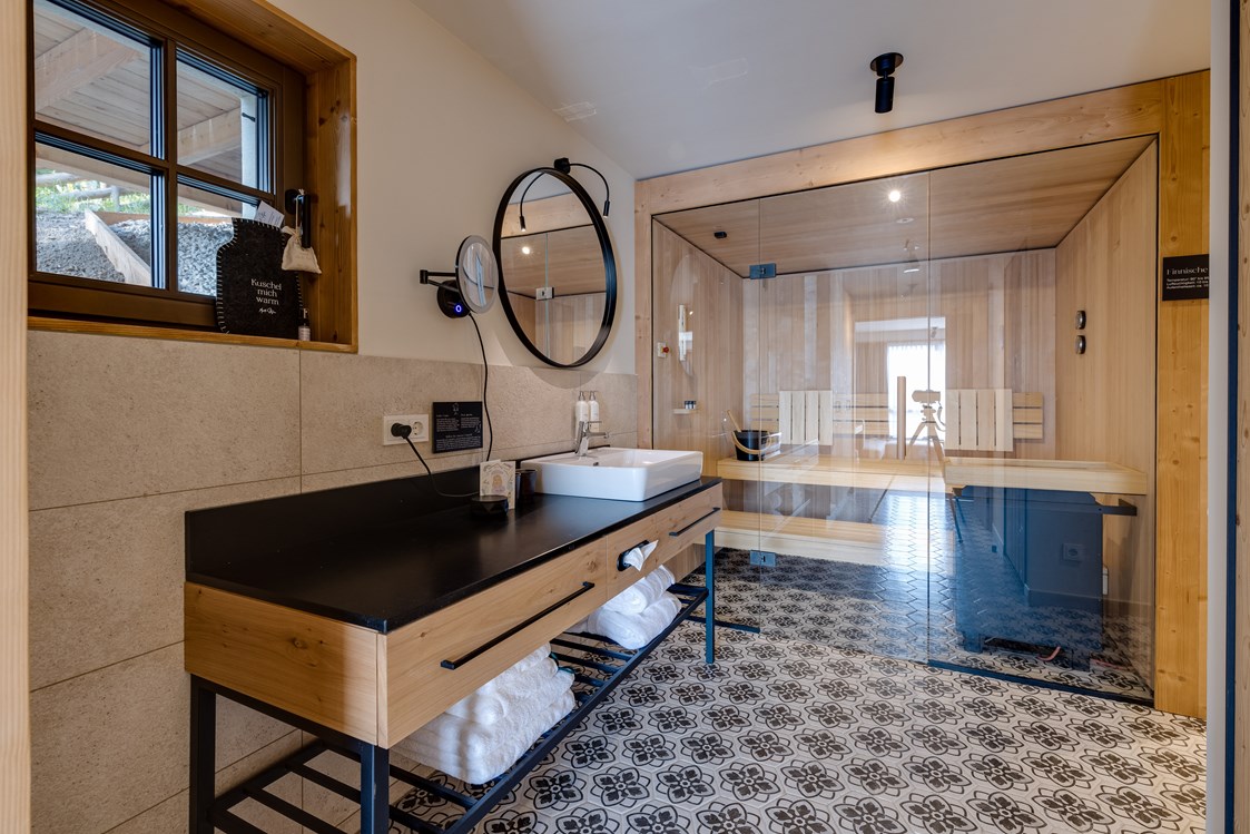 Chalet: Badzimmer und Sauna im Untergeschoss - Bergdorf Montestyria Mariazell