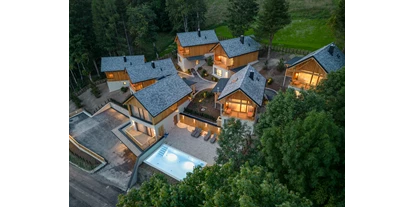 Hüttendorf - Parkplatz direkt an der Hütte - Steiermark - Bergdorf Montestyria Mariazell - Hideaway Hotel Montestyria Chalets & Suiten
