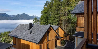Hüttendorf - Parkplatz direkt an der Hütte - Steiermark - Ausblick vom Bergdorf - Hideaway Hotel Montestyria Chalets & Suiten