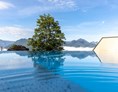 Chalet: Pool mit Ausblick - Hideaway Hotel Montestyria Chalets & Suiten