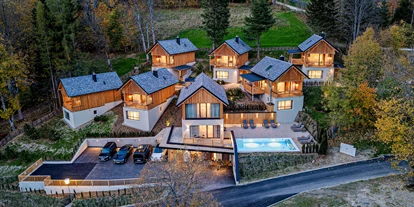 Hüttendorf - Parkplatz direkt an der Hütte - Steiermark - Hideaway Hotel Montestyria Chalets & Suiten
