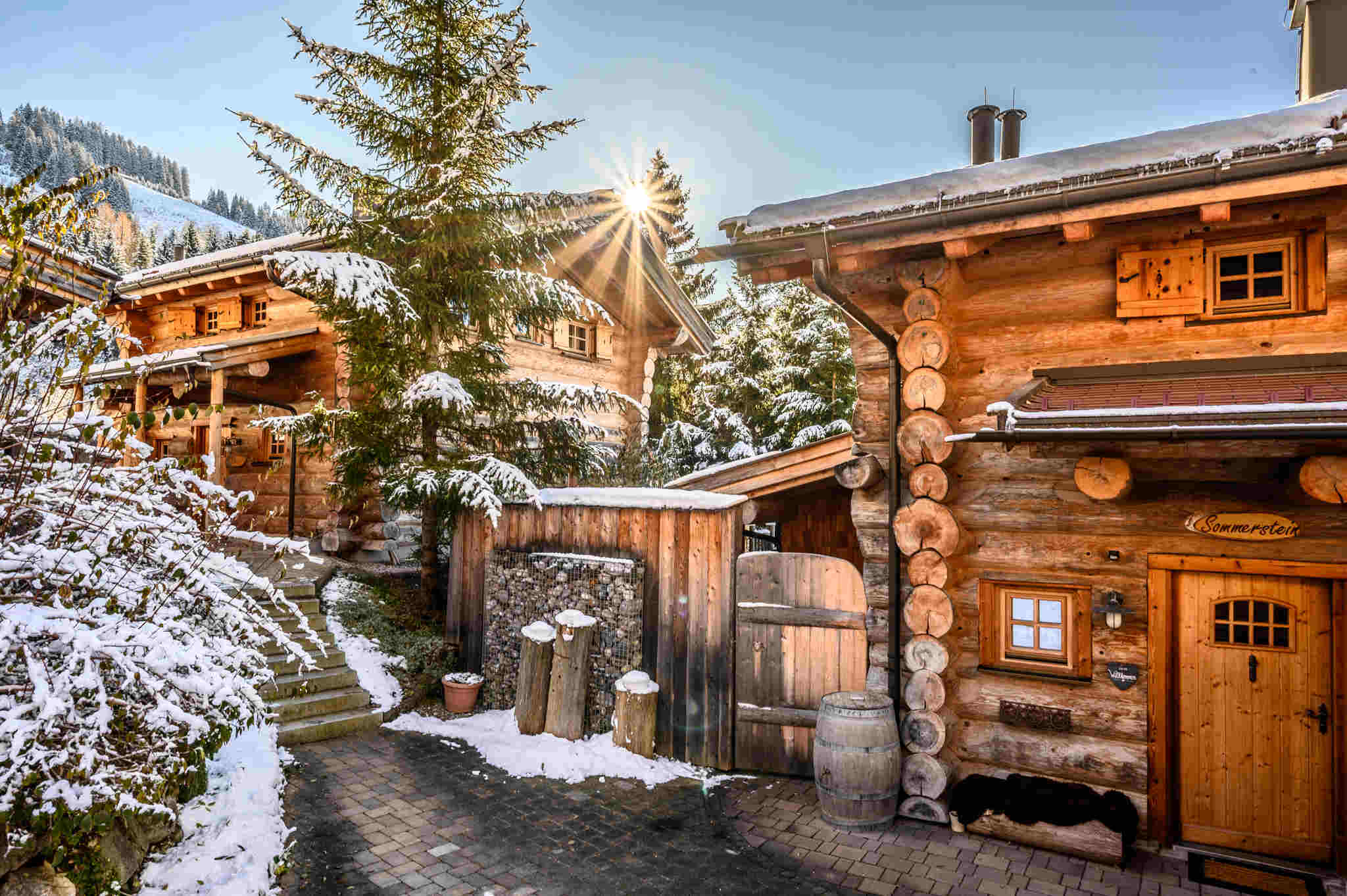Hüttendorf - offener Kamin - March (Taxenbach) - Luxus Chalets neben der Skipiste und neben den Wander- und Mountainbikewegen  der Region Hochkönig - Safe Island Austria - Premium Chalets Maria Alm