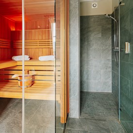 Chalet: Alle Ferienhäuser verfügen über eine Sauna. - Torfhaus HARZRESORT