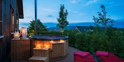Hüttendorf - PLZ 38871 (Deutschland) - Alle Kuschellodges verfügen über einen Whirlpool. - Torfhaus HARZRESORT