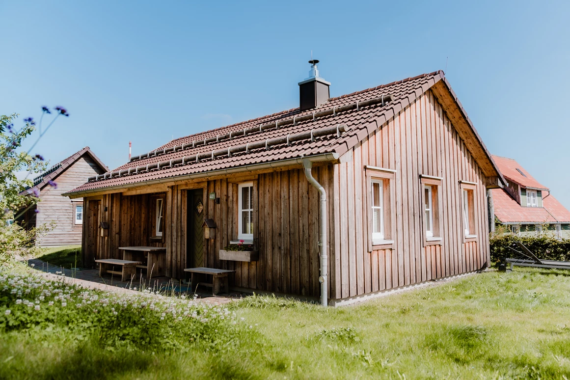 Chalet: Kuschel Lodge mit Himmelbett, freistehender Badewanne, Kamin, Sauna und eigenen Whirpool.  - Torfhaus HARZRESORT
