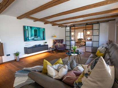 Hüttendorf - Whirlpool: beim Chalet - Scheunenloft - bis 4 Personen 
Wohnbereich  - Das MUSSEA Landhaus Chalet & Scheunenloft