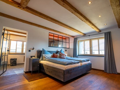 Hüttendorf - Whirlpool: beim Chalet - Scheunenloft - bis 4 Personen 
Zweites Schlafzimmer mit Bad én Suite - Das MUSSEA Landhaus Chalet & Scheunenloft