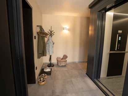 Hüttendorf - Whirlpool: beim Chalet - Scheunenloft - bis 4 Personen 
Wellnessbereich - Kneippbecken - Das MUSSEA Landhaus Chalet & Scheunenloft
