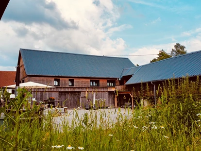 Hüttendorf - Whirlpool: beim Chalet - Scheunenloft - bis 4 Personen 
Außenansicht  - Das MUSSEA Landhaus Chalet & Scheunenloft