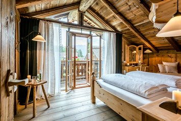 Chalet: Großes Schlafzimmer in den einstöckigen Berg- und Premium Chalets. - PRIESTEREGG Premium ECO Resort