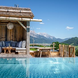 Chalet: Beheizter Infinitypool mit Panoramabergblick im PRIESTEREGG BAD - PRIESTEREGG Premium ECO Resort