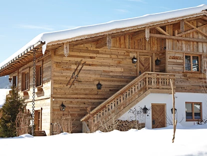 Hüttendorf - Schröcken - Außenansicht Chalet im Winter - Chalet F