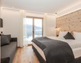 Chalet: Schlafzimmer mit zusätzlichem Schlafsofa - Hauserhof Chalet