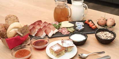 Hüttendorf - Ski-In/Ski-Out: Ski-In - Frühstückskorb - Hauserhof Chalet