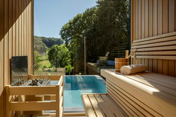 Chalet: Sauna mit Panorama-Glas --> Sauna mit traumhaften Ausblick - Julianhof - Premium Guesthouse & Spa