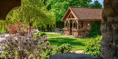 Hüttendorf - Parkplatz direkt an der Hütte - Heumanns Blockhäuser am Wald