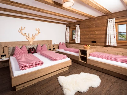 Hüttendorf - Chaletgröße: 8 - 10 Personen - Schlafzimmer mit 4 Betten - Bergchalet Rauchenhof