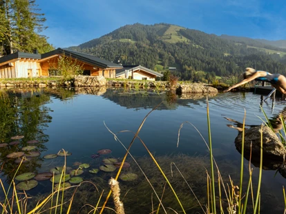 Hüttendorf - Schröcken - Sprung in Badeteich - Alpenflair-Chalets- Balderschwang