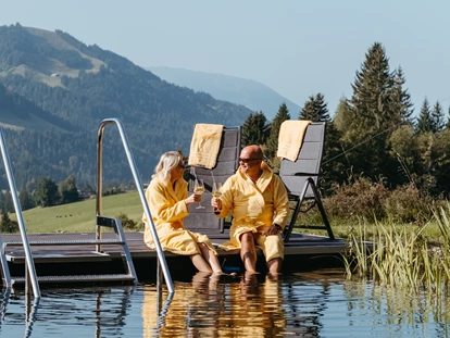 Hüttendorf - Schröcken - Schwimmteich im Sommer - Alpenflair-Chalets- Balderschwang