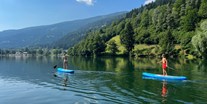 Hüttendorf - Chaletgröße: mehr als 10 Personen - StandUp Paddling am Afritzersee - DualResorts Afritz am See
