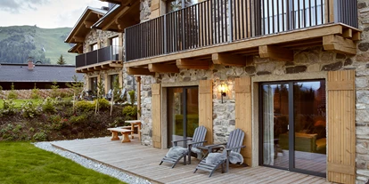 Hüttendorf - Weng (Goldegg) - Im Sommer draußen entspannen und Sonne tanken - Kauz - Design Chalets