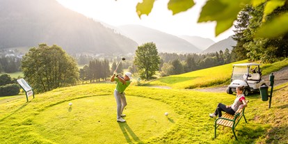 Hüttendorf - Schwerpunkt: Familienurlaub - Golfen mit Bergpanorama - Trattlers Hof-Chalets