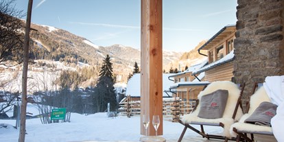 Hüttendorf - Ski-In/Ski-Out: Ski-In & Ski-Out - Beheizte Außenwanne - Trattlers Hof-Chalets