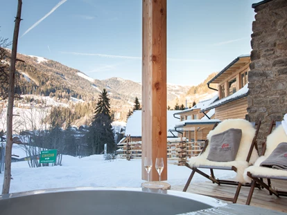 Hüttendorf - Chaletgröße: 8 - 10 Personen - Beheizte Außenwanne - Trattlers Hof-Chalets