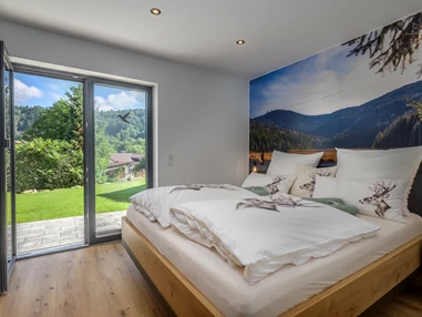 Chalet: Schlafzimmer mit Doppelbett - Woid_Liebe&Glück Chalets Bodenmais