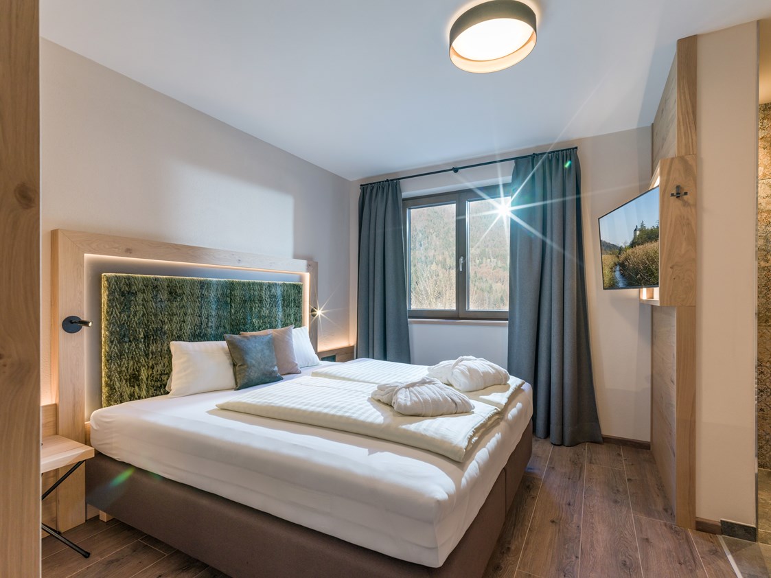 Chalet: Schlafzimmer Parterre - Chalet´s und Hotel Mariasteinerhof - Weitblickchalets