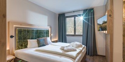 Hüttendorf - Kirchberg in Tirol - Schlafzimmer Parterre - Chalet´s und Hotel Mariasteinerhof - Weitblickchalets