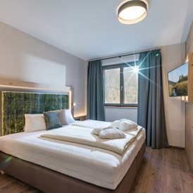 Chalet: Schlafzimmer Parterre - Chalet´s und Hotel Mariasteinerhof - Weitblickchalets