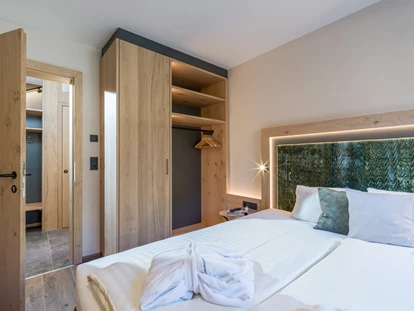 Hüttendorf - Fügenberg - Schlafzimmer 1. Obergeschoss - Chalet´s und Hotel Mariasteinerhof - Weitblickchalets