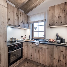 Chalet: Hobbyköche freuen sich - die Küchen sind perfekt ausgestattet - Aadla Walser-Chalets am Arlberg