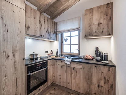Hüttendorf - Schröcken - Hobbyköche freuen sich - die Küchen sind perfekt ausgestattet - Aadla Walser-Chalets am Arlberg