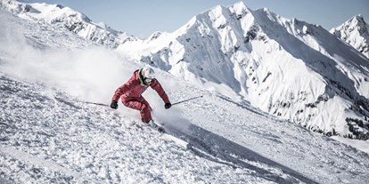 Hüttendorf - Ski-In/Ski-Out: Ski-In - Das Gebiet Warth-Schröcken ist für seine Freerideabfahrten bekannt, von denen viele bequem über den Lift erreichbar sind - Aadla Walser-Chalets am Arlberg