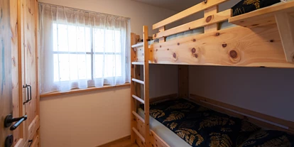 Hüttendorf - St. Oswald (Eberstein) - Zirbenzimmer mit Stockbett - Enzianhütte
