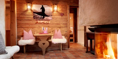 Hüttendorf - Snow Space Salzburg - Flachau - Wagrain - St. Johann - offener Kamin vor der Sauna - Almdorf Flachau
