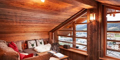 Hüttendorf - Snow Space Salzburg - Flachau - Wagrain - St. Johann - gemütliche Leseecke am Heuboden im 10er Chalet - Almdorf Flachau