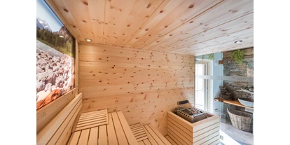 Hüttendorf - Schröcken - Biosauna aus Zirben Holz - Almdorf Tirol am Haldensee