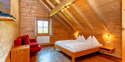 Hüttendorf - Chaletgröße: 8 - 10 Personen - eines der 6 Schlafzimmer der Hütte - Hüttendorf Schladming