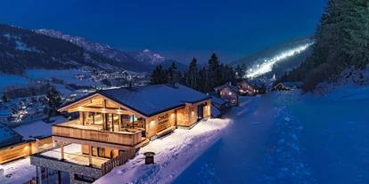 Hüttendorf - Chaletgröße: 8 - 10 Personen - Unsere Chalets mit Indoorpool direkt an der Piste und mit Blick auf Schladming. - Hüttendorf Schladming