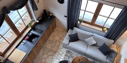 Hüttendorf - Weng (Goldegg) - Chalet am Bachl 1 Wohnzimmer - Hideaway Eggerfeld